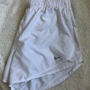 White Nike shorts